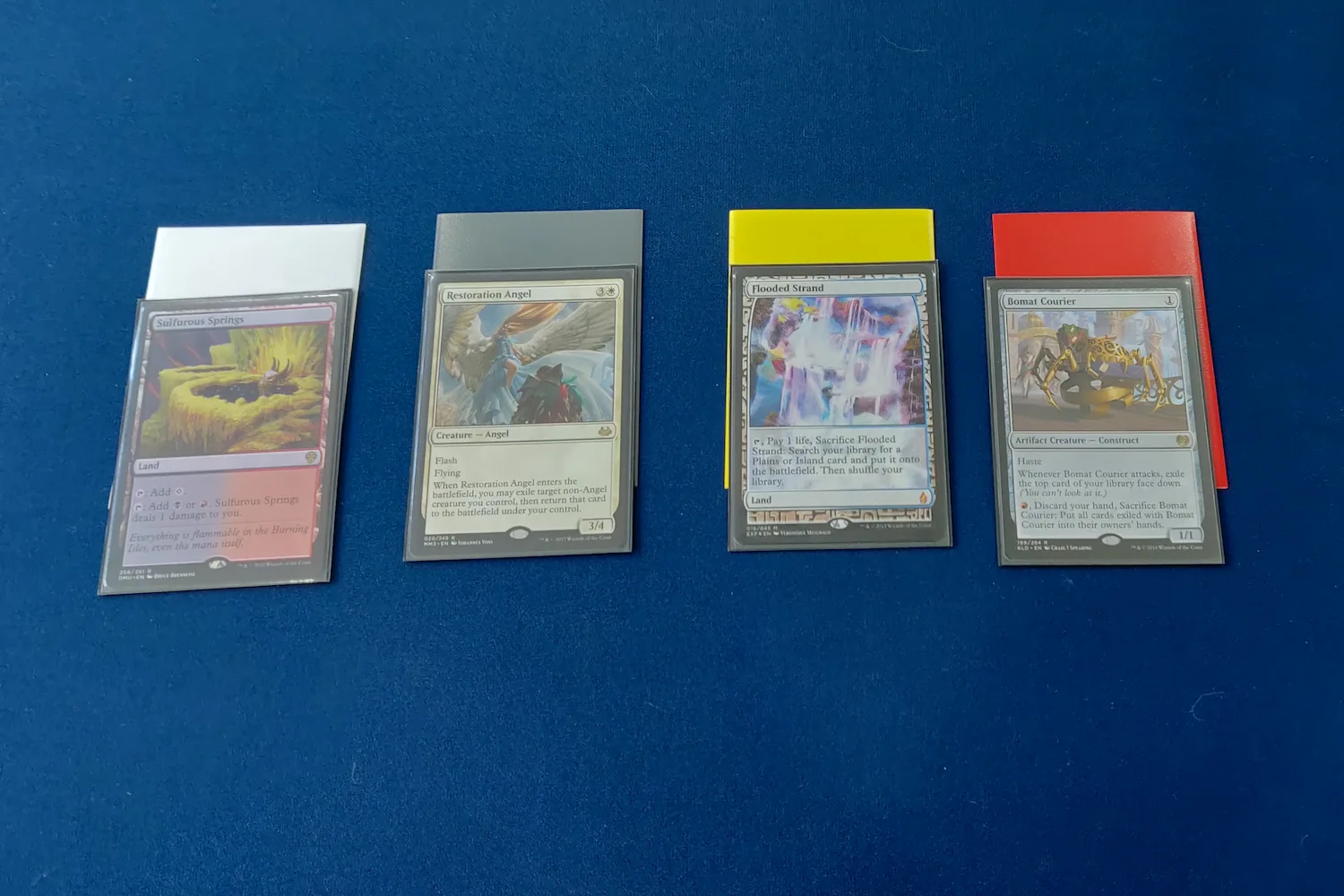 Winchester draft with four piles of cards on the table